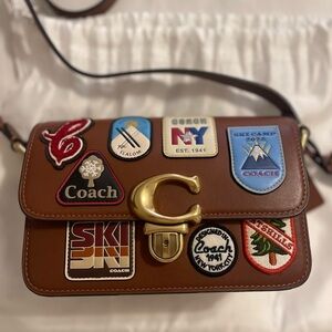 Coach studio 19 with patches